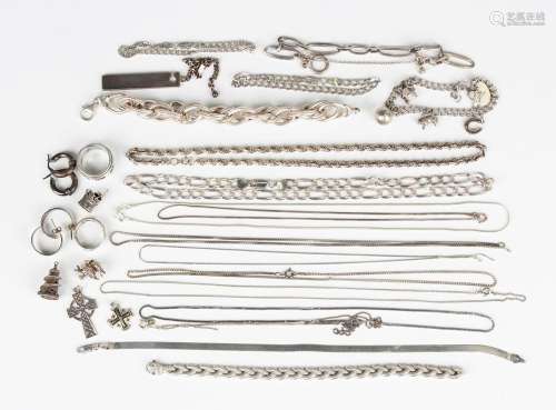 A group of mostly silver jewellery, comprising a charm brace...