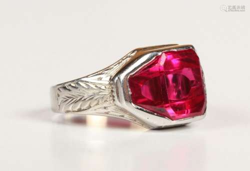 A white gold and synthetic ruby solitaire ring, probably Ame...