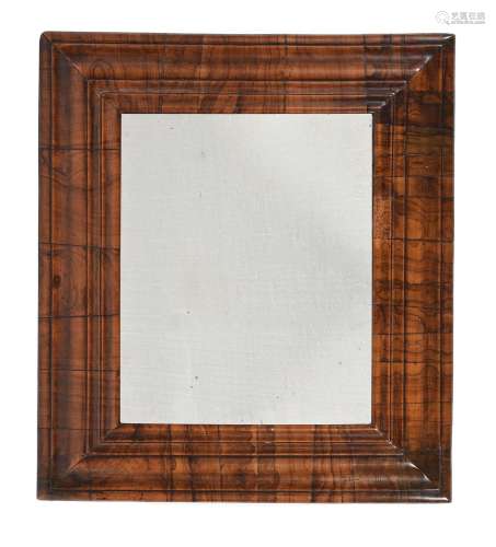 A WILLIAM & MARY FIGURED WALNUT CUSHION FRAMED MIRROR, L...