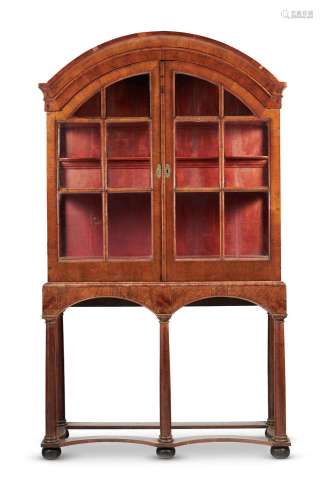 A WALNUT DISPLAY CABINET ON STAND, THE CABINET EARLY 18TH CE...