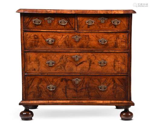 A WILLIAM & MARY FIGURED WALNUT AND FEATHER BANDED CHEST...