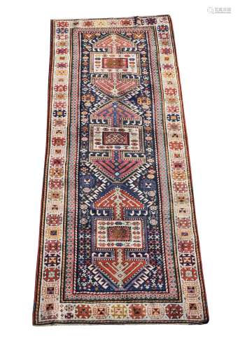 A CAUCASIAN RUG, approximately 278 x 91cm
