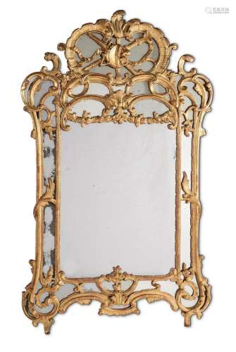 A LOUIS XV CARVED GILTWOOD MIRROR, CIRCA 1755