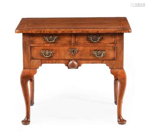 A GEORGE II WALNUT AND FEATHER BANDED SIDE TABLE OR LOWBOY, ...