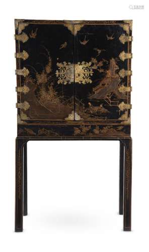 A BLACK LACQUER AND GILT JAPANNED CABINET ON STAND, 18TH CEN...
