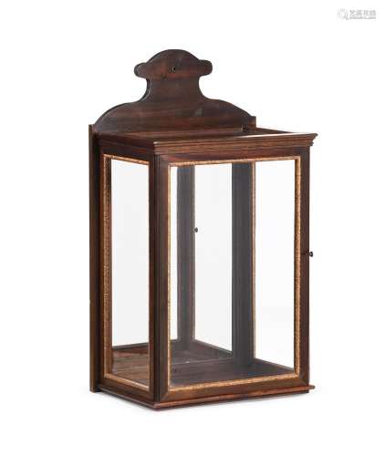 A GLAZED, PARCEL GILT AND MAHOGANY WALL LANTERN, IN MID 18TH...