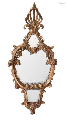 A GEORGE III GILTWOOD WALL MIRROR OR PIER GLASS, IN THE MANN...