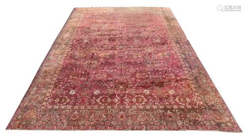 AN AGRA CARPET, approximately 682 x 446cm