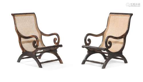 A PAIR OF ANGLO INDIAN CALAMANDER AND CANED ARMCHAIRS, IN EA...