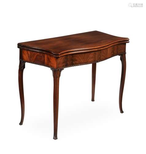A GEORGE III MAHOGANY SERPENTINE FOLDING CARD TABLE, IN THE ...