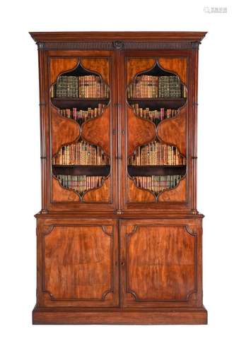 AN UNUSUAL GEORGE III MAHOGANY AND EXOTIC HARDWOOD BOOKCASE,...