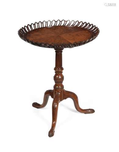 A MAHOGANY TRIPOD TABLE WITH 'BASKET' TOP, IN GEORGE III STY...
