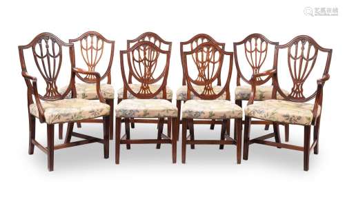 A SET OF EIGHT GEORGE III MAHOGANY DINING CHAIRS, AFTER DESI...