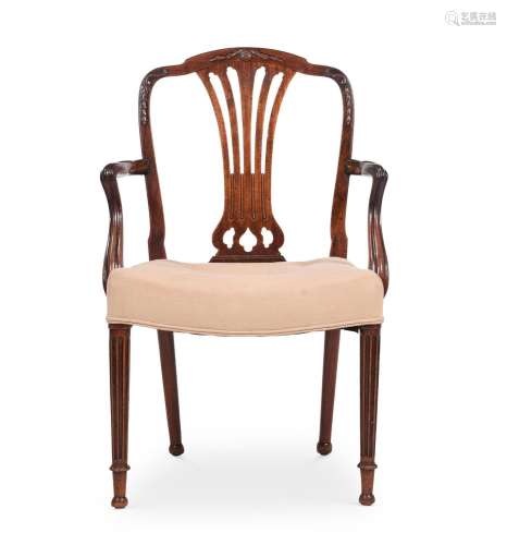 A GEORGE III MAHOGANY ARMCHAIR, AFTER A DESIGN BY GEORGE HEP...