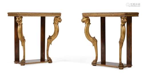 Y A PAIR OF ROSEWOOD AND PARCEL GILT CONSOLE TABLES, IN REGE...