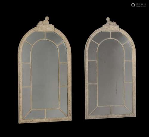 A PAIR OF PAINTED WALL MIRRORSIN THE MANNER OF DESIGNS BY RO...