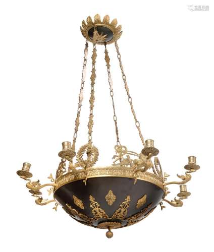 AN EMPIRE REVIVAL GILT METAL AND EBONISED-LIGHT CHANDELIER, ...