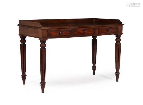 A GEORGE IV MAHOGANY DRESSING TABLE, IN THE MANNER OF GILLOW...