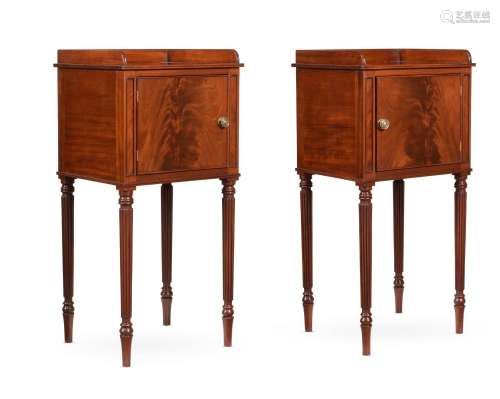 A PAIR OF MAHOGANY BEDSIDE CUPBOARDS, IN REGENCY STYLE, OF R...