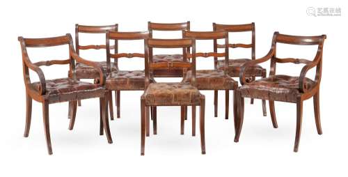 A SET OF EIGHT REGENCY MAHOGANY AND LEATHER UPHOLSTERED DINI...