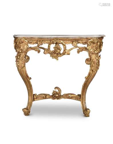 A PAIR OF GILTWOOD AND COMPOSITION CONSOLE TABLES, IN ROCOCO...