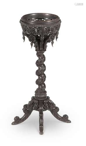 Y A CEYLONESE CARVED SOLID EBONY JARDINIERE STAND, IN THE MA...