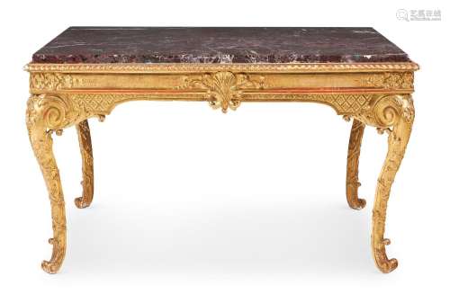 A CARVED GILTWOOD AND GESSO CENTRE TABLE, BY BEDEL & CIE...