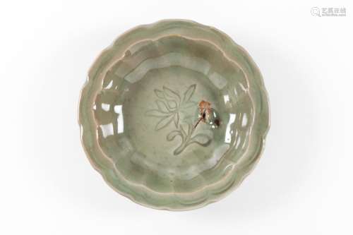 A small Longquan celadon 'lotus' dish