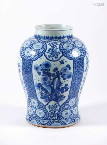 A large blue and white baluster vase