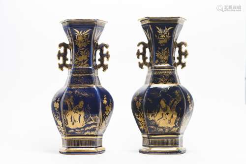 Two gilt-decorated blue-ground vases