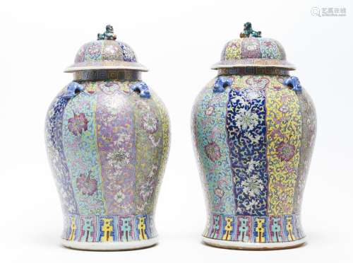 A pair of Famille Rose baluster vases and covers