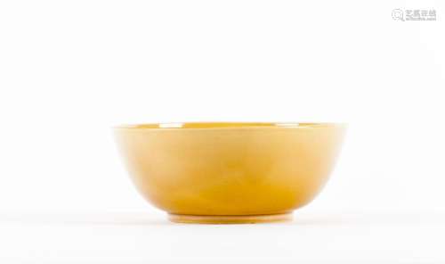 A yellow glazed bowl