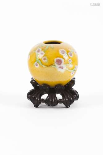 A yellow glazed waterpot