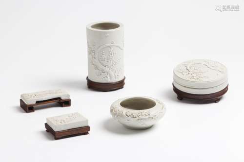 A set of five biscuit porcelain scholar desk implements