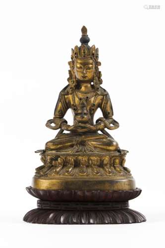 A Tibetan gilt-bronze figure of Buddha Amitayus