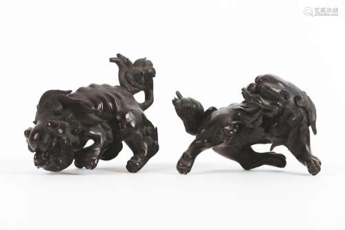 A pair of bronze Buddhist lions