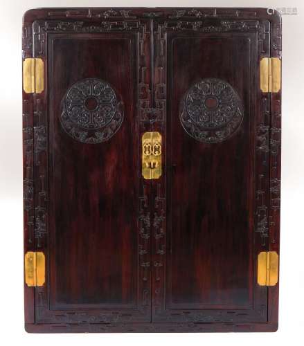 An important hogmu carved cabinet