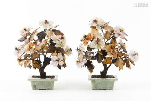 A pair of jadeite and hardstones jardinières with blossoming...