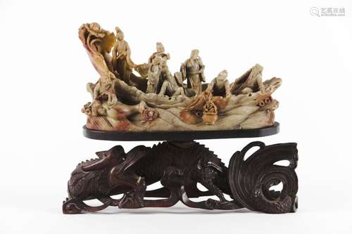 A soapstone carving of the Eight Immortals on a raft