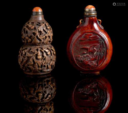 Two relief-decorated ceramic snuff bottles