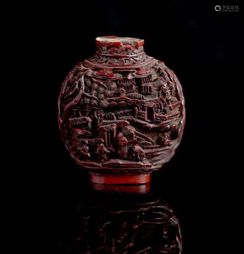 A carved cinnabar lacquer snuff bottle