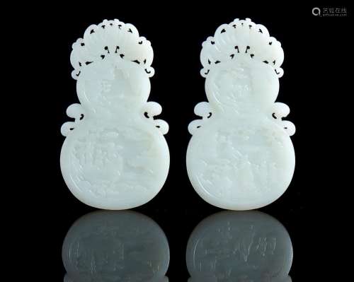 A pair of white jade double-gourd plaques