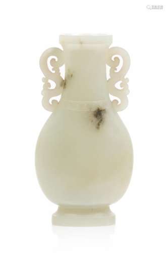 A small Chinese celadon jade vase