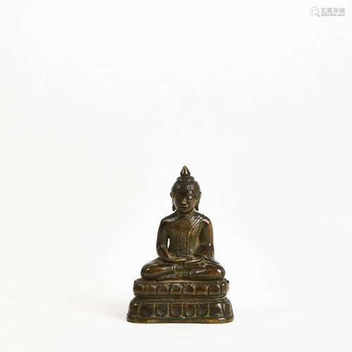 Petit sujet en bronze représentant le Bouddha en méditation....