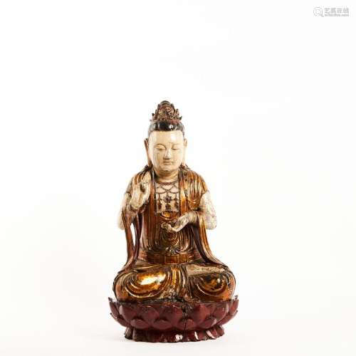 Bouddha de style Xixia. <br />
Bois sculpté polychrome et do...