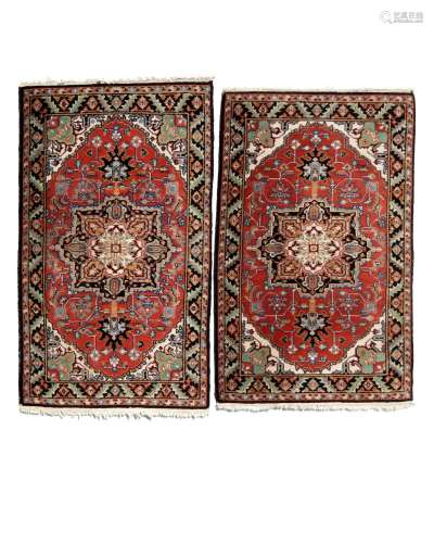 A pair of Heriz area rugs