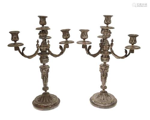 A pair of French silver-plated convertible candelabra