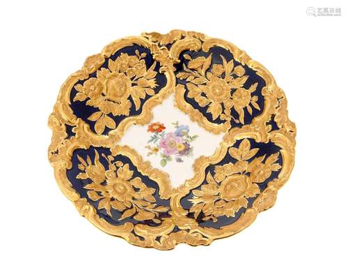 A Meissen gold and enameled porcelain cabinet plate