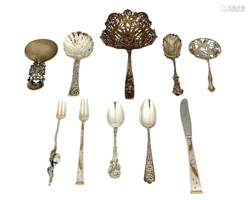 A group of sterling silver flatware