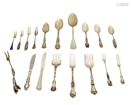 A group of sterling silver flatware